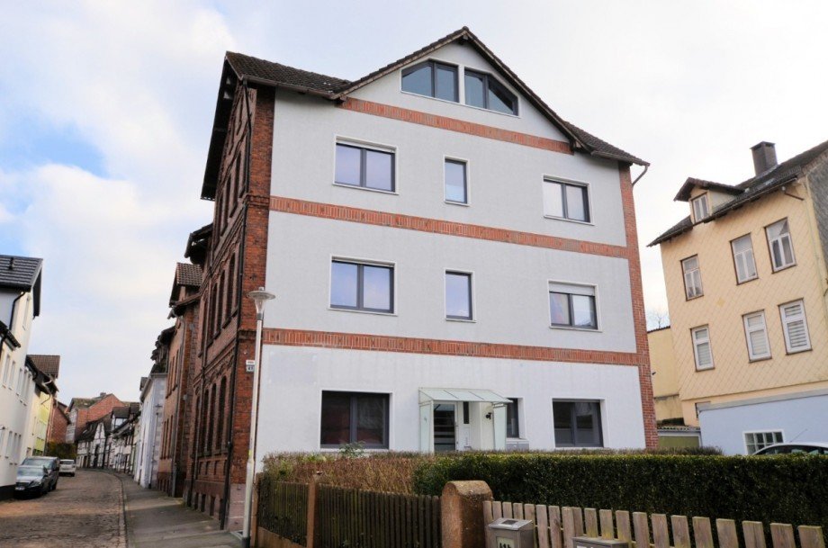 6-Familienwohnhaus mit 2 Garagen in Stadtlage - Heise Immobilien Mehrfamilienhaus Holzminden