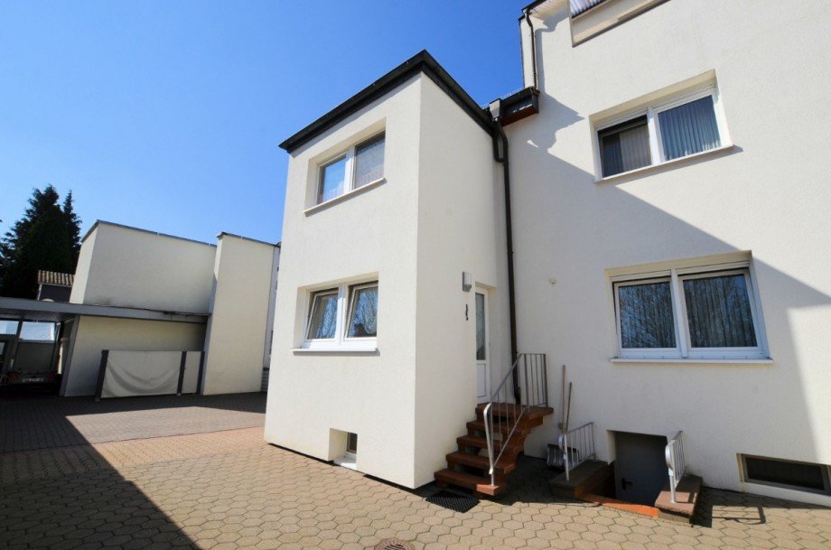 Heise Immobilien Holzminden - Doppelhaush�lfte mit Garage Mehrfamilienhaus Holzminden