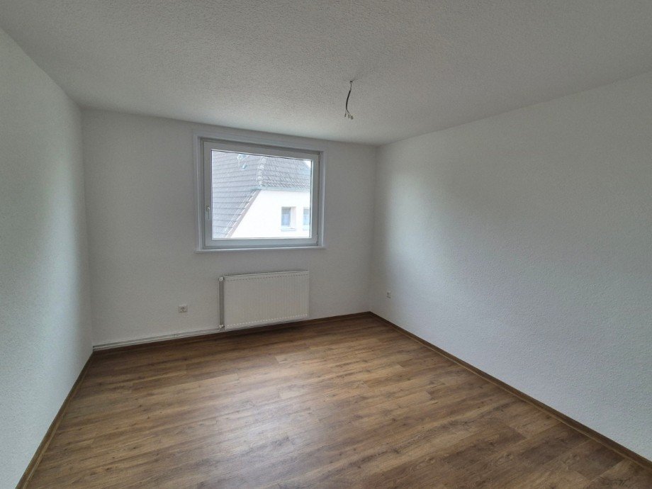 Schlafzimmer - Heise Immobilien Dachgeschosswohnung Holzminden