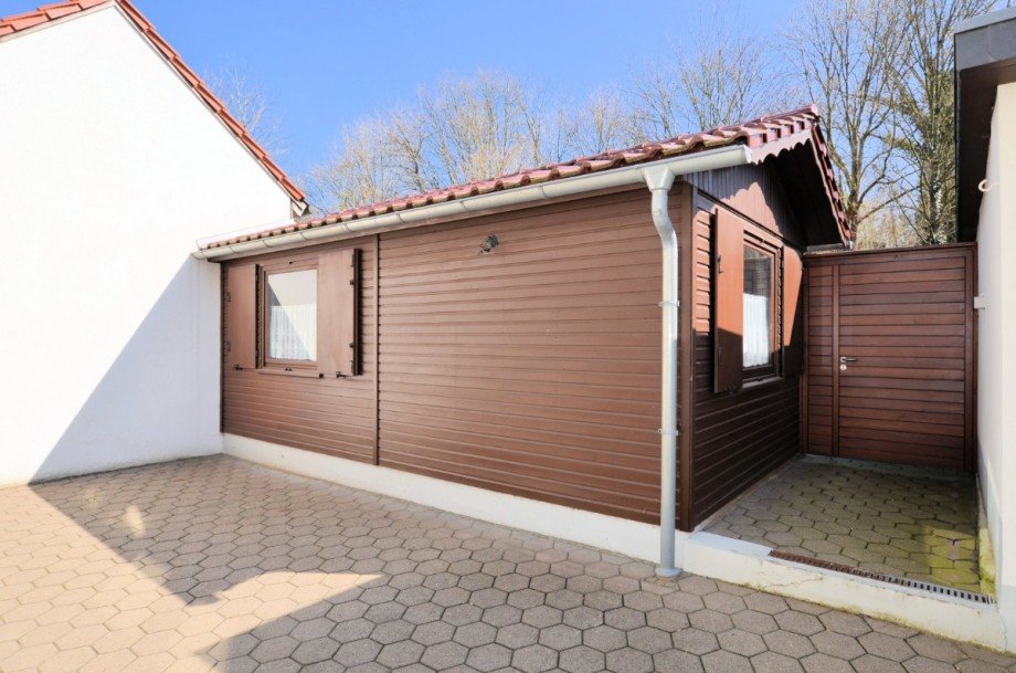 Heise Immobilien Holzminden - Doppelhaush�lfte mit Garage Mehrfamilienhaus Holzminden