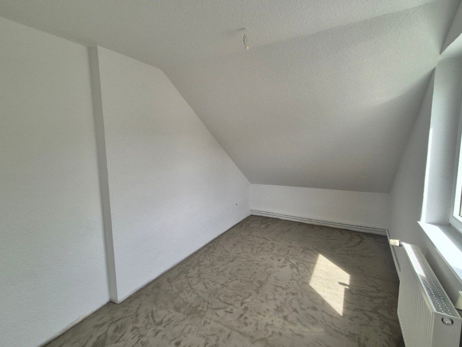 Schlafzimmer - Heise Immobilien Dachgeschosswohnung Holzminden