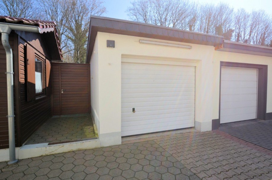 Heise Immobilien Holzminden - Doppelhaush�lfte mit Garage Mehrfamilienhaus Holzminden