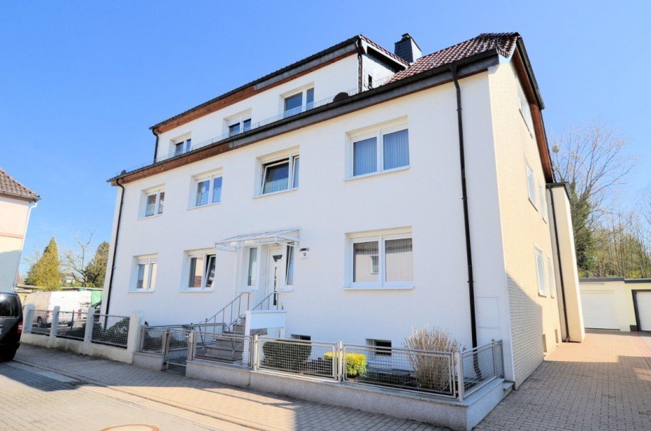 Heise Immobilien Holzminden - Doppelhaush�lfte mit Garage Mehrfamilienhaus Holzminden