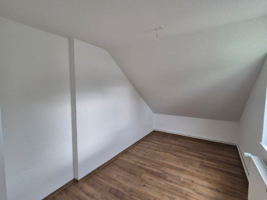 Schlafzimmer - Heise Immobilien Dachgeschosswohnung Holzminden