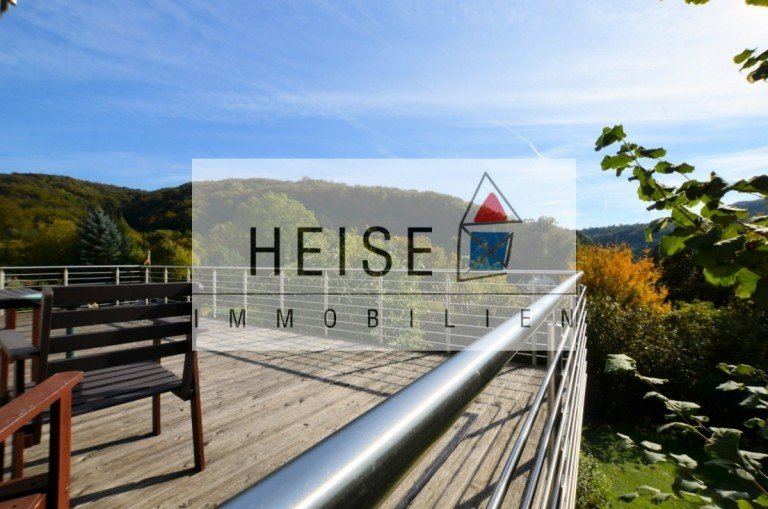 Heise Immobilien - R�hle - Bodenwerder Bodenwerder - R�hle Mehrfamilienhaus 3-Familien-Doppelhaush�lfte mit unverbaubarer Fernsicht in die R�hler Schweiz