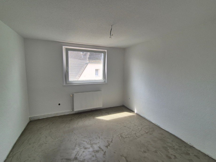 Schlafzimmer - Heise Immobilien Dachgeschosswohnung Holzminden