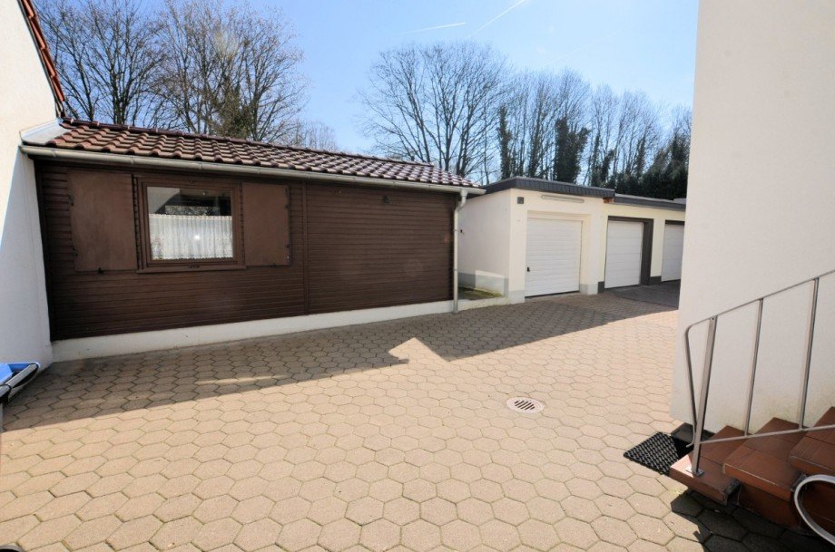 Heise Immobilien Holzminden - Doppelhaush�lfte mit Garage Mehrfamilienhaus Holzminden
