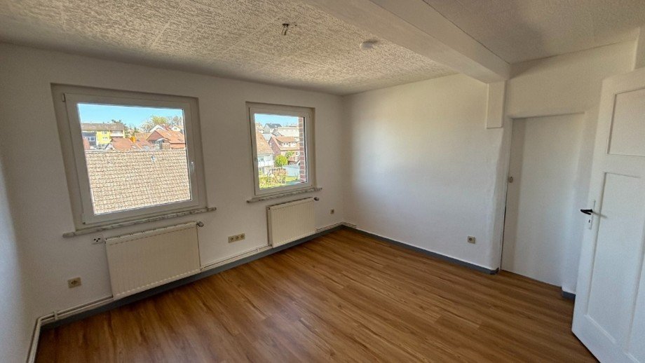 Wohnzimmer - www.immobilien-heise.de Dachgeschosswohnung Holzminden