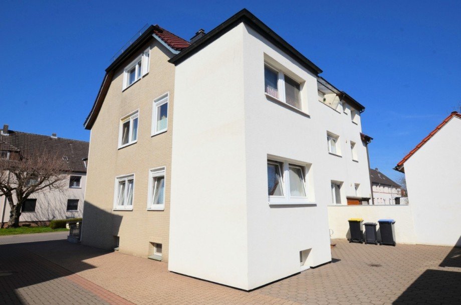 Heise Immobilien Holzminden - Doppelhaush�lfte mit Garage Mehrfamilienhaus Holzminden